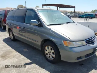 2002 Honda Odyssey EX-L with VIN 5FNRL187X2B007581, listed as a IAAI auction lot 42610133 with 245,431 mi miles and . Bid and sale history available at DreamBid. Image 1.