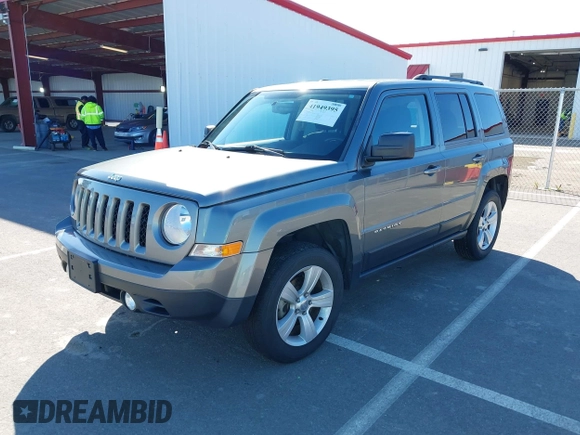2014 Jeep Patriot Sport with VIN 1C4NJRBB5ED574390, listed as a IAAI auction lot 41949395 with 61,911 mi miles. Bid and sale history available at carsss.com. Image 2.