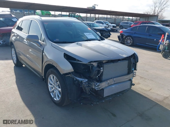 2023 Cadillac XT4 FWD Luxury with VIN 1GYAZAR41PF149914, listed as a IAAI auction lot 41709996 with 4,345 mi miles. Bid and sale history available at carsss.com. Image 1.