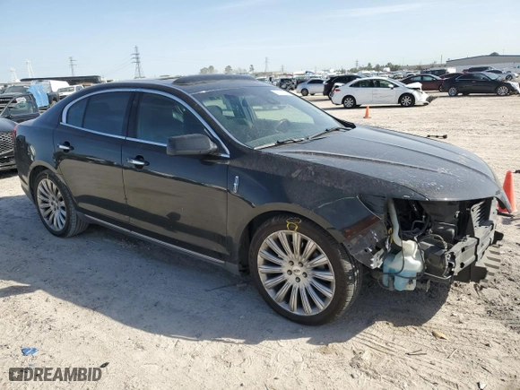 2013 Lincoln MKS with VIN 1LNHL9DK2DG602899, listed as a Copart auction lot 48201745 with 73,911 mi miles and Salvage Title. Bid and sale history available at carsss.com. Image 4.