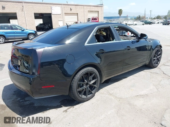 2008 Cadillac CTS RWD with VIN 1G6DV57V580151819, listed as a IAAI auction lot 42097590 with Not Provided miles and . Bid and sale history available at DreamBid. Image 4.