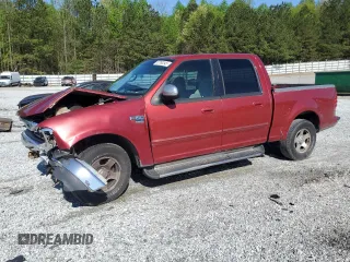 2001 Ford F-150 XLT with VIN 1FTRW07W51KD90678, listed as a Copart auction lot 52760545 with 242,661 mi miles and Salvage title. Bid and sale history available at DreamBid. Image 1.