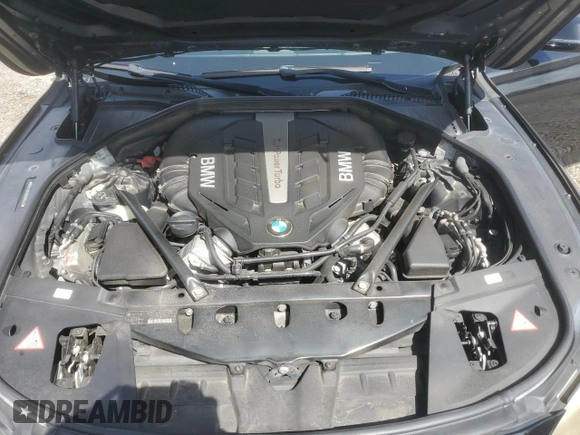 2013 BMW 7 Series 750i with VIN WBAYA8C58DC996431, listed as a Copart auction lot 70366064 with 106,580 mi miles and Salvage Title. Bid and sale history available at DreamBid. Image 13.