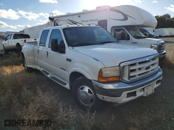 2001 Ford F-350 XL with VIN 1FTWW32F31ED39867, listed as a Copart auction lot 80069644 with 241,113 mi miles and Salvage title. Bid and sale history available at DreamBid. Image 4.