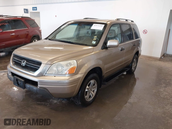 2005 Honda Pilot EX-L with VIN 2HKYF18595H542103, listed as a IAAI auction lot 41472326 with 269,844 mi miles. Bid and sale history available at carsss.com. Image 2.