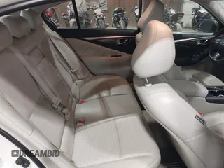 2015 Infiniti Q50 z VIN JN1BV7ARXFM409367, wystawiony jako IAAI lot #41912056 z przebiegiem 126 382 mil mil oraz . Historia ofert i sprzedaży dostępna na DreamBid. Obrazek 8.
