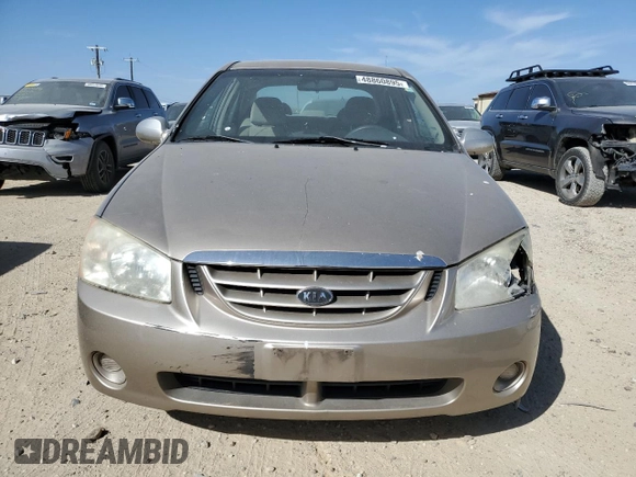2006 Kia Spectra EX with VIN KNAFE121565364950, listed as a Copart auction lot 48860895 with 209,615 mi miles and Salvage Title. Bid and sale history available at DreamBid. Image 5.