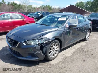 2015 Mazda Mazda6 i Sport with VIN JM1GJ1U55F1182451, listed as a IAAI auction lot 42079526 with 140,321 mi miles. Bid and sale history available at carsss.com. Image 2.