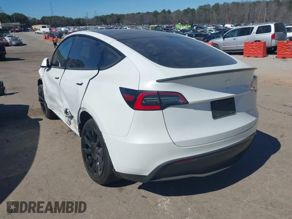 2021 Tesla Model Y Long Range with VIN 5YJYGDEE8MF125104, listed as a IAAI auction lot 41698065 with 25,177 mi miles and . Bid and sale history available at DreamBid. Image 3.