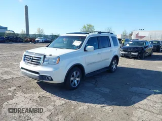2012 Honda Pilot Touring with VIN 5FNYF4H98CB057659, listed as a IAAI auction lot 41927990 with 140,000 mi miles. Bid and sale history available at carsss.com. Image 2.