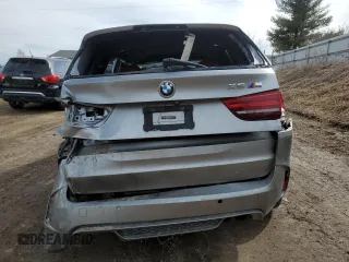 2015 BMW X5 M z VIN 5YMKT6C55F0C89017, wystawiony jako Copart lot #49052065 z przebiegiem 125 287 mil mil oraz Tytuł czysty. Historia ofert i sprzedaży dostępna na DreamBid. Obrazek 6.