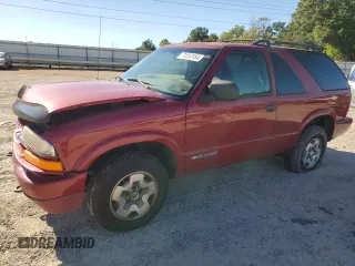 2001 Chevrolet Blazer LS z VIN 1GNCT18W61K145060, wystawiony jako Copart lot #71013154 z przebiegiem 223 041 mil mil oraz Szkoda całkowita • Salvage title. Historia ofert i sprzedaży dostępna na DreamBid. Obrazek 1.