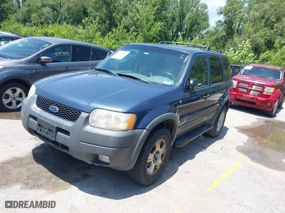 2001 Ford Escape XLT with VIN 1FMCU041X1KF10409, listed as a IAAI auction lot 39780383 with 246,336 mi miles. Bid and sale history available at carsss.com. Image 2.