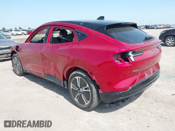 2023 Ford Mustang Mach-E Premium z VIN 3FMTK3R40PMA88565, wystawiony jako IAAI lot #42245792 z przebiegiem 21 394 mil mil oraz . Historia ofert i sprzedaży dostępna na DreamBid. Obrazek 3.