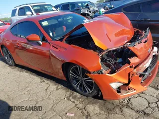 2015 Scion FR-S z VIN JF1ZNAA12F9704233, wystawiony jako IAAI lot #42043931 z przebiegiem 141 298 mil mil oraz . Historia ofert i sprzedaży dostępna na DreamBid. Obrazek 1.