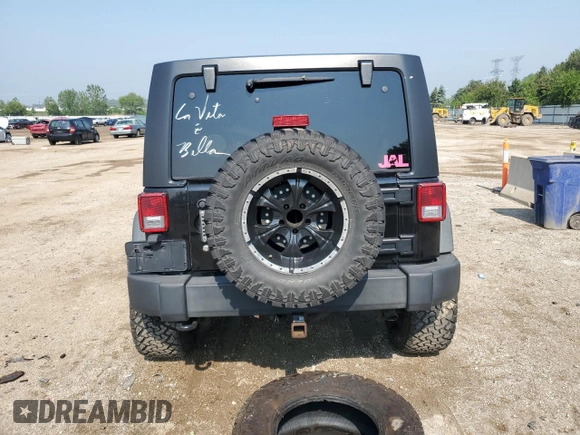 2012 Jeep Wrangler Unlimited Sport with VIN 1C4BJWDG8CL116811, listed as a Copart auction lot 59372085 with 95,498 mi miles and Salvage title. Bid and sale history available at DreamBid. Image 6.