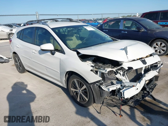 2019 Subaru Impreza Premium z VIN 4S3GTAD67K3741323, wystawiony jako IAAI lot #41979934 z przebiegiem 64 311 mil mil oraz . Historia ofert i sprzedaży dostępna na DreamBid. Obrazek 1.