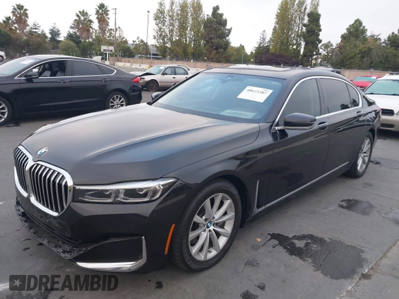 2022 BMW 7 Series 740i with VIN WBA7T2C0XNCJ31291, listed as a IAAI auction lot 40623307 with 98,877 mi miles. Bid and sale history available at carsss.com. Image 2.