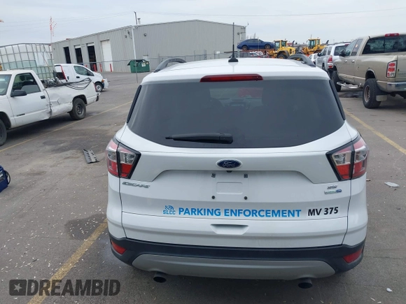 2018 Ford Escape SE z VIN 1FMCU9GD0JUC62783, wystawiony jako IAAI lot #41488153 z przebiegiem 55 774 mil mil oraz . Historia ofert i sprzedaży dostępna na DreamBid. Obrazek 16.