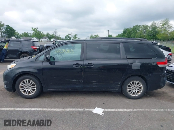 2012 Toyota Sienna XLE AAS with VIN 5TDYK3DC3CS255214, listed as a IAAI auction lot 42390803 with 113,425 mi miles and . Bid and sale history available at DreamBid. Image 14.