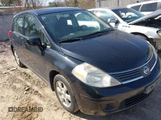 2009 Nissan Versa 1.8 S with VIN 3N1BC13E39L409657, listed as a IAAI auction lot 41981554 with 146,675 mi miles. Bid and sale history available at carsss.com. Image 1.