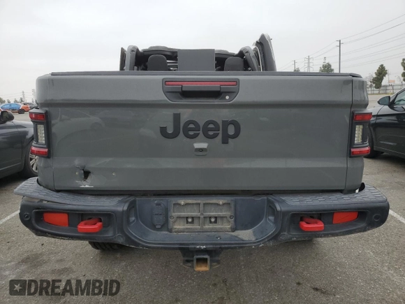 2020 Jeep Gladiator Sport S z VIN 1C6HJTAG6LL193553, wystawiony jako Copart lot #55638915 z przebiegiem 84 600 mil mil oraz Szkoda całkowita • Salvage title. Historia ofert i sprzedaży dostępna na DreamBid. Obrazek 6.