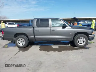 2001 Dodge Dakota z VIN 1B7HL2AX51S333575, wystawiony jako IAAI lot #41782582 z przebiegiem 291 640 mil mil oraz . Historia ofert i sprzedaży dostępna na DreamBid. Obrazek 13.