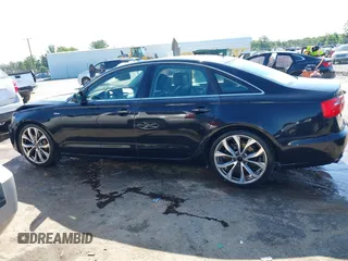2013 Audi A6 Premium Plus with VIN WAUGGAFC7DN155006, listed as a IAAI auction lot 42535357 with 163,235 mi miles and . Bid and sale history available at DreamBid. Image 14.