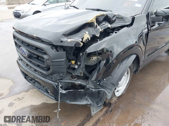 2023 Ford F-150 XL with VIN 1FTMF1C51PKE97197, listed as a IAAI auction lot 41904003 with 17,394 mi miles and . Bid and sale history available at DreamBid. Image 6.