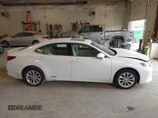 2014 Lexus ES 300h with VIN JTHBW1GG2E2067189, listed as a IAAI auction lot 42404843 with 182,798 mi miles and . Bid and sale history available at DreamBid. Image 13.