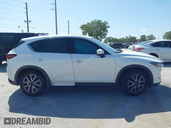 2018 Mazda CX-5 Grand Touring with VIN JM3KFADM2J1422512, listed as a IAAI auction lot 42010801 with 48,567 mi miles and . Bid and sale history available at DreamBid. Image 13.