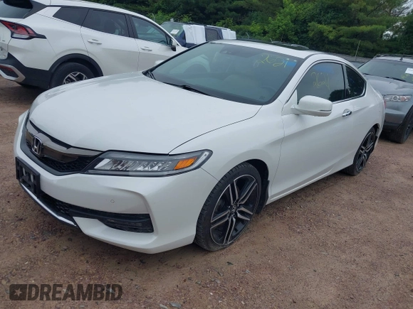 2016 Honda Accord Touring with VIN 1HGCT2B09GA007614, listed as a IAAI auction lot 42532621 with 200,935 mi miles and . Bid and sale history available at DreamBid. Image 2.