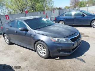 2011 Kia Optima LX with VIN KNAGM4A78B5066644, listed as a IAAI auction lot 42011172 with 172,862 mi miles. Bid and sale history available at carsss.com. Image 1.