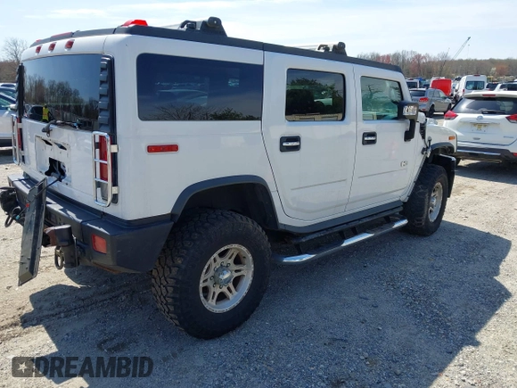 2006 Hummer H2 with VIN 5GRGN23U86H104660, listed as a IAAI auction lot 41933116 with 165,734 mi miles. Bid and sale history available at carsss.com. Image 4.
