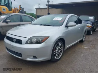 2008 Scion tC Spec with VIN JTKDE167580236127, listed as a IAAI auction lot 41962153 with 218,676 mi miles. Bid and sale history available at carsss.com. Image 2.