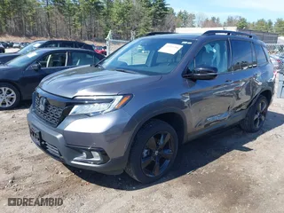 2021 Honda Passport Elite with VIN 5FNYF8H08MB011467, listed as a IAAI auction lot 41929708 with 34,106 mi miles. Bid and sale history available at carsss.com. Image 2.