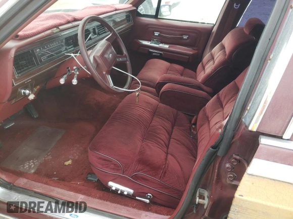 1987 Ford Crown Victoria z VIN 2FABP79F7HX228617, wystawiony jako Copart lot #82165434 z przebiegiem 99 456 mil mil oraz Szkody całkowita. Historia ofert i sprzedaży dostępna na DreamBid. Obrazek 7.