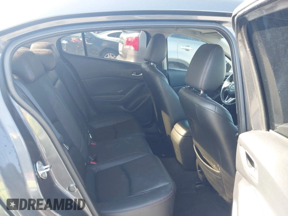 2016 Mazda Mazda3 i Grand Touring with VIN JM1BM1X79G1278079, listed as a IAAI auction lot 42010729 with 104,797 mi miles. Bid and sale history available at carsss.com. Image 8.
