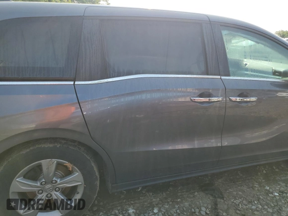 2019 Honda Odyssey EX with VIN 5FNRL6H58KB013889, listed as a Copart auction lot 57077025 with 126,467 mi miles and Salvage title. Bid and sale history available at DreamBid. Image 11.