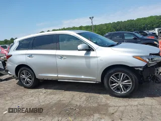 2020 Infiniti QX60 Luxe z VIN 5N1DL0MN7LC529460, wystawiony jako IAAI lot #42338248 z przebiegiem 97 883 mil mil oraz . Historia ofert i sprzedaży dostępna na DreamBid. Obrazek 14.