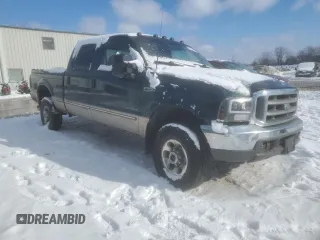 1999 Ford Super Duty F-250 XL with VIN 1FTNW21F4XED02133, listed as a Copart auction lot 88128985 with 227,187 mi miles and Salvage Title. Bid and sale history available at carsss.com. Image 4.