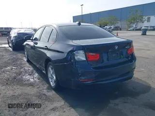 2013 BMW 3 Series 328i with VIN WBA3C1C58DK103904, listed as a IAAI auction lot 41590683 with 108,615 mi miles. Bid and sale history available at carsss.com. Image 3.