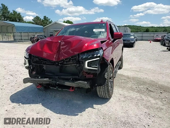 2021 Chevrolet Tahoe Z71 z VIN 1GNSKPKD9MR349131, wystawiony jako Copart lot #59009405 z przebiegiem 24 115 mil mil oraz Szkoda całkowita • Salvage title. Historia ofert i sprzedaży dostępna na DreamBid. Obrazek 15.