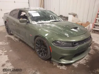 2020 Dodge Charger Scat Pack with VIN 2C3CDXGJ7LH120617, listed as a IAAI auction lot 41270023 with 118,924 mi miles. Bid and sale history available at carsss.com. Image 1.