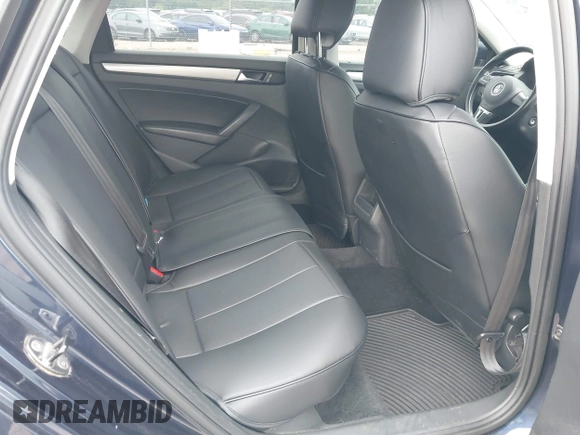 2014 Volkswagen Passat Wolfsburg Edition with VIN 1VWAT7A35EC044446, listed as a IAAI auction lot 42558007 with 165,285 mi miles and . Bid and sale history available at DreamBid. Image 8.