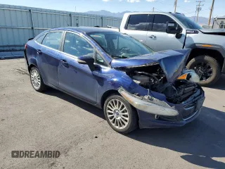 2016 Ford Fiesta Titanium z VIN 3FADP4CJ7GM157983, wystawiony jako Copart lot #75773954 z przebiegiem 149 363 mil mil oraz Szkoda całkowita • Salvage title. Historia ofert i sprzedaży dostępna na DreamBid. Obrazek 4.