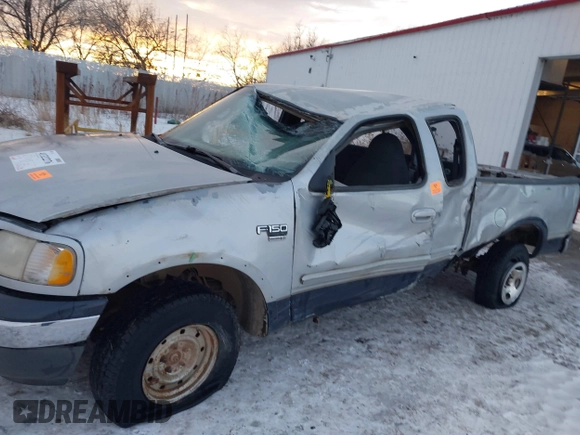 1999 Ford F-150 XL with VIN 1FTRX18LXXNA44916, listed as a IAAI auction lot 41322276 with 1 mi miles. Bid and sale history available at carsss.com. Image 15.