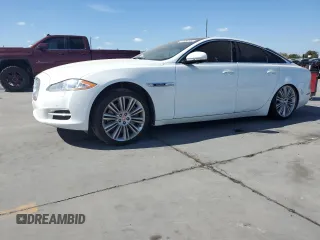 2014 Jaguar XJ Supercharged z VIN SAJWA1GT2EMV60178, wystawiony jako Copart lot #77797354 z przebiegiem 116 578 mil mil oraz Czysty tytuł • Clean title. Historia ofert i sprzedaży dostępna na DreamBid. Obrazek 1.