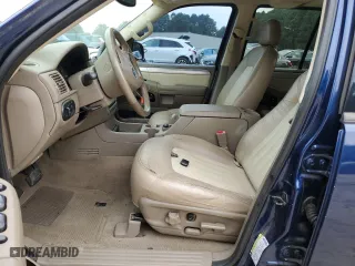 2004 Mercury Mountaineer Convenience with VIN 4M2ZU86K44ZJ49011, listed as a Copart auction lot 69615444 with 135,702 mi miles and Salvage Title. Bid and sale history available at carsss.com. Image 7.