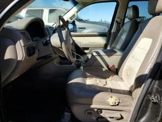 2005 Ford Explorer Eddie Bauer z VIN 1FMDU74W65UB20491, wystawiony jako Copart lot #74141504 z przebiegiem 159 563 mil mil oraz Czysty tytuł • Clean title. Historia ofert i sprzedaży dostępna na DreamBid. Obrazek 7.
